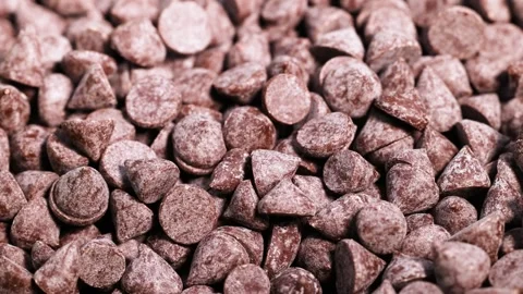 Chocolate Chips Falling and Settling Stock Footage 312030585