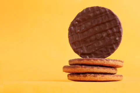 Chocolate coated cookie. Stock Photos