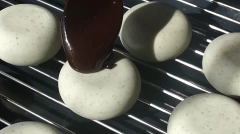 Chocolate coating is poured on the cake Stock Footage 62812245