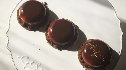 Chocolate coating is poured on the cake Stock-Footage 62812254