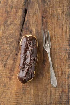 Chocolate cocoa nibs eclair Stock Photos