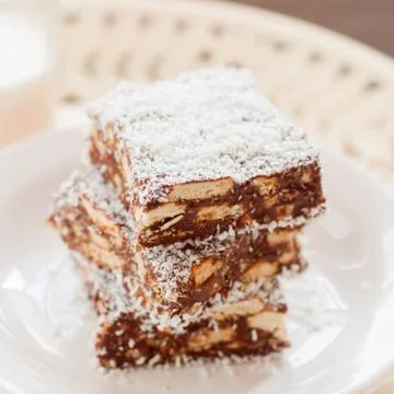 Chocolate Coconut Slice with Biscuits Stock Photos