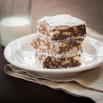 Chocolate Coconut Slice with Biscuits Stock Photos
