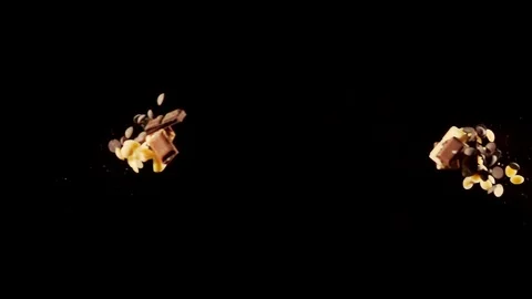 Chocolate  collide on black background closeup in super slow motion Stock Footage 117211577