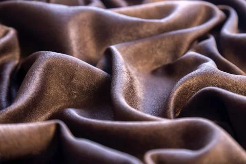 Chocolate colored fabric background, backdrop or elegant wallpaper design. Stock Photos