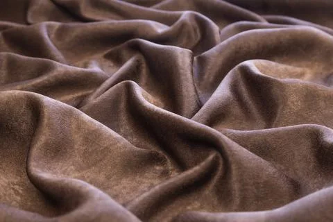 Chocolate colored fabric background, backdrop or elegant wallpaper design. Stock Photos