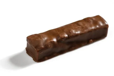 Chocolate confection with a smooth, glossy surface resting clean white backdr Stock Photos