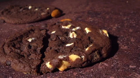 Chocolate Cookie Breaking Open Showing Soft Center With Almond Pieces Stock Footage 331980773