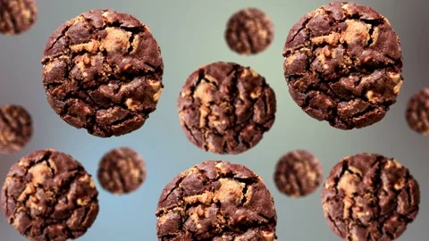 Chocolate cookies of different diameters on gradient background. 4K UHD footage Video stock 166412402