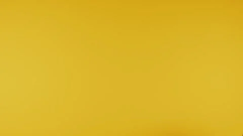 Chocolate corn cereal balls moving up and down on a yellow background. Stock Footage 142061595