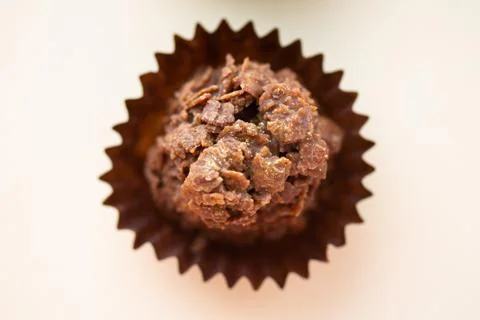 Chocolate corn flake cake in brown paper cupcake case Stock Photos