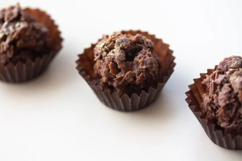 Chocolate corn flake cake in brown paper cupcake case Stock Photos