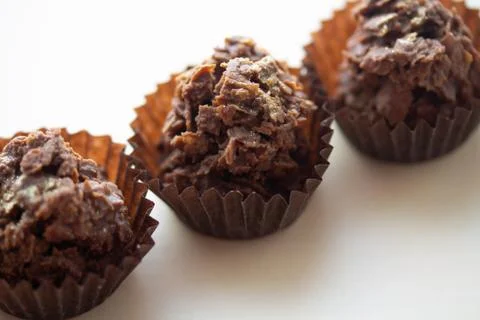 Chocolate corn flake cake in brown paper cupcake case Stock Photos
