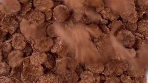 Chocolate Corn Flakes Falling Into The Plate Top View Stock Footage 228234619