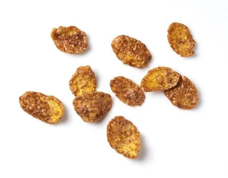 Chocolate cornflakes placed on a white background. Stock Photos