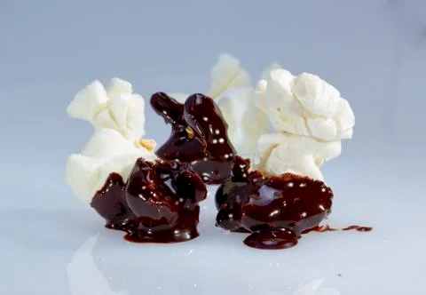 Chocolate covered popcorn. Stock Photos