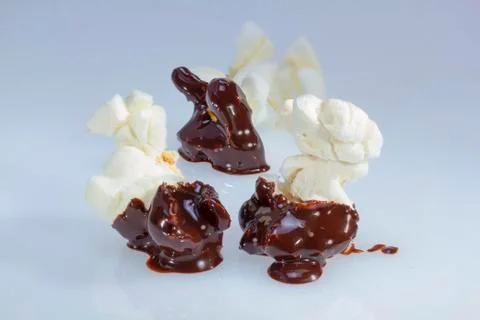 Chocolate covered popcorn. Stock Photos