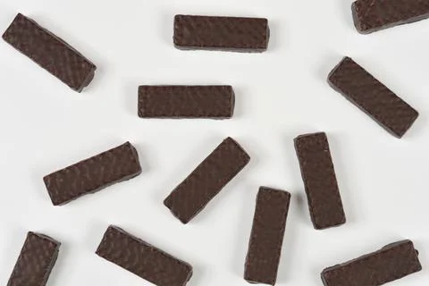 Chocolate covered wafer bars pattern on white background Stock Photos