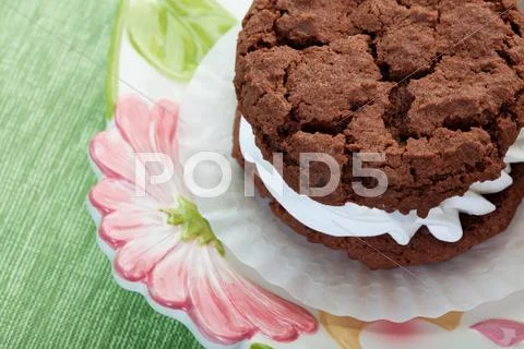 Chocolate cream filled cookie Stock Photos