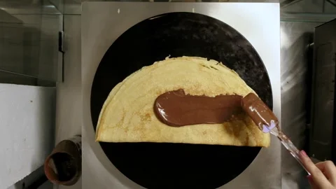 Chocolate Crepe preparation Stock Footage 247411901