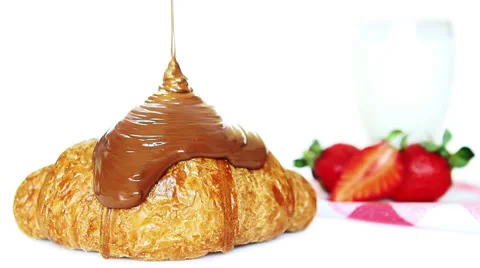 Chocolate on croissant Stock Footage 24789212