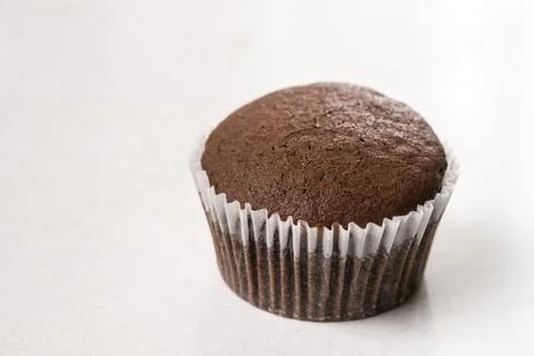 Chocolate cup cake on the white marble background with copy space Stock Photos