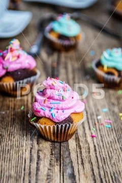 Chocolate cupcake with cream Stock Photos