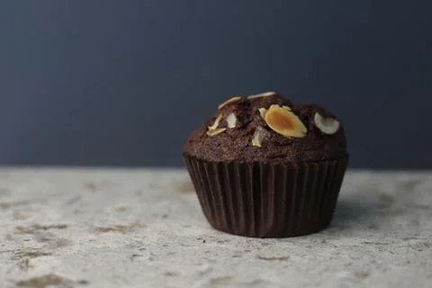 Chocolate cupcake with nuts Stock Photos