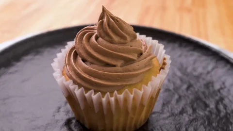 Chocolate Cupcake Rotating Side View Video stock 126164319