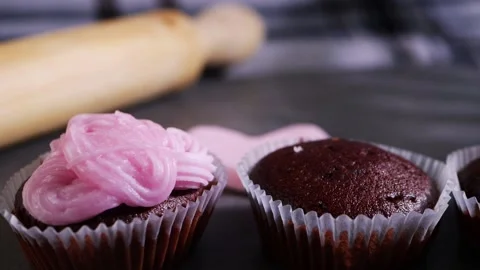 Chocolate cupcakes ready for decorating Stock Footage 169469411