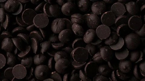 Chocolate. dark chocolate chips top view. confectionery concept Stock Footage 147985122