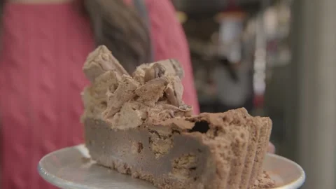 Chocolate Dessert Slice Held on Plate in Sydney Cafe Interior Close-Up Stock Footage 345666962
