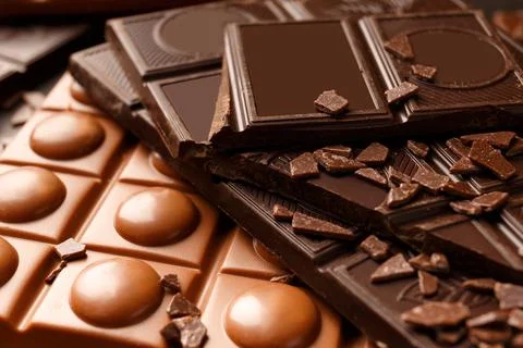 Chocolate of different types, close-up. Chocolate background. Stock Photos