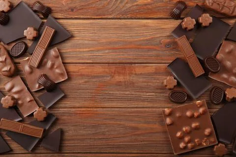 Chocolate of different types on a colored background with a place for text Fotos de archivo