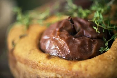 Chocolate dipped apples in a sponge cake Stock Photos