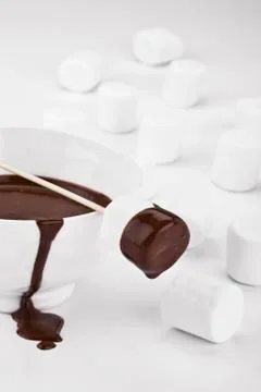 Chocolate dipped marshmallows Stock Photos