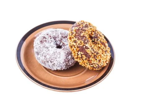 Chocolate donuts on plate Stock Photos