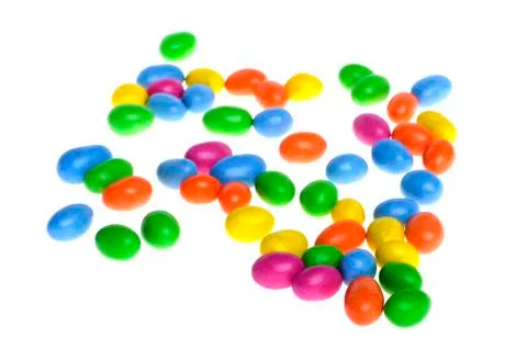 Chocolate dragee on white Stock Photos