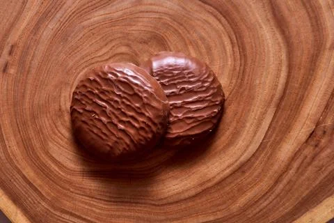 Chocolate drenched cookies. Macro effect photo. Stock Photos