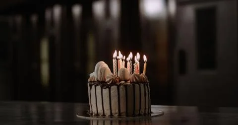 Chocolate drip cake with sparkler for a birthday or celebration Stock Photos