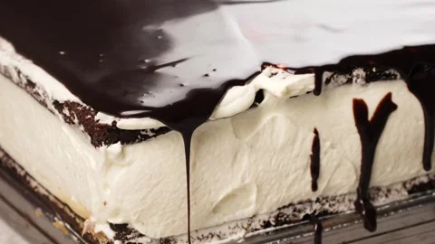 Chocolate drips off the cake Stock Footage 260867582