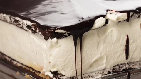 Chocolate drips off the cake Stock Footage 260867596