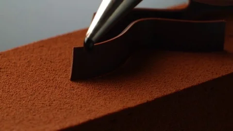 Chocolate drop on coffee cake Stock-Footage 81792333