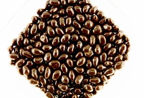 Chocolate drops candy pattern on white background Chocolate drops candy pa... Stock Photos
