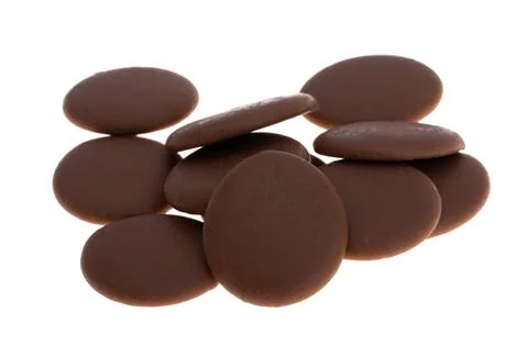 Chocolate drops isolated Stock Photos