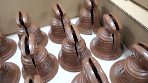 Chocolate Easter bells arranged in box Stock Footage 334564444