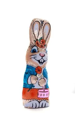 Chocolate Easter bunny on an isolated white background, female figure Stock Photos