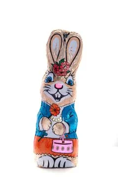 Chocolate Easter bunny on an isolated white background, female figure Stock Photos