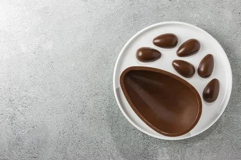 Chocolate easter egg on the table. Stock Photos