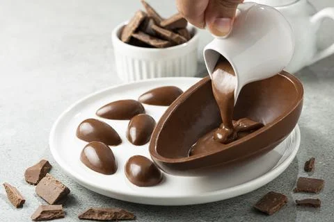 Chocolate easter egg on the table. Stock Photos